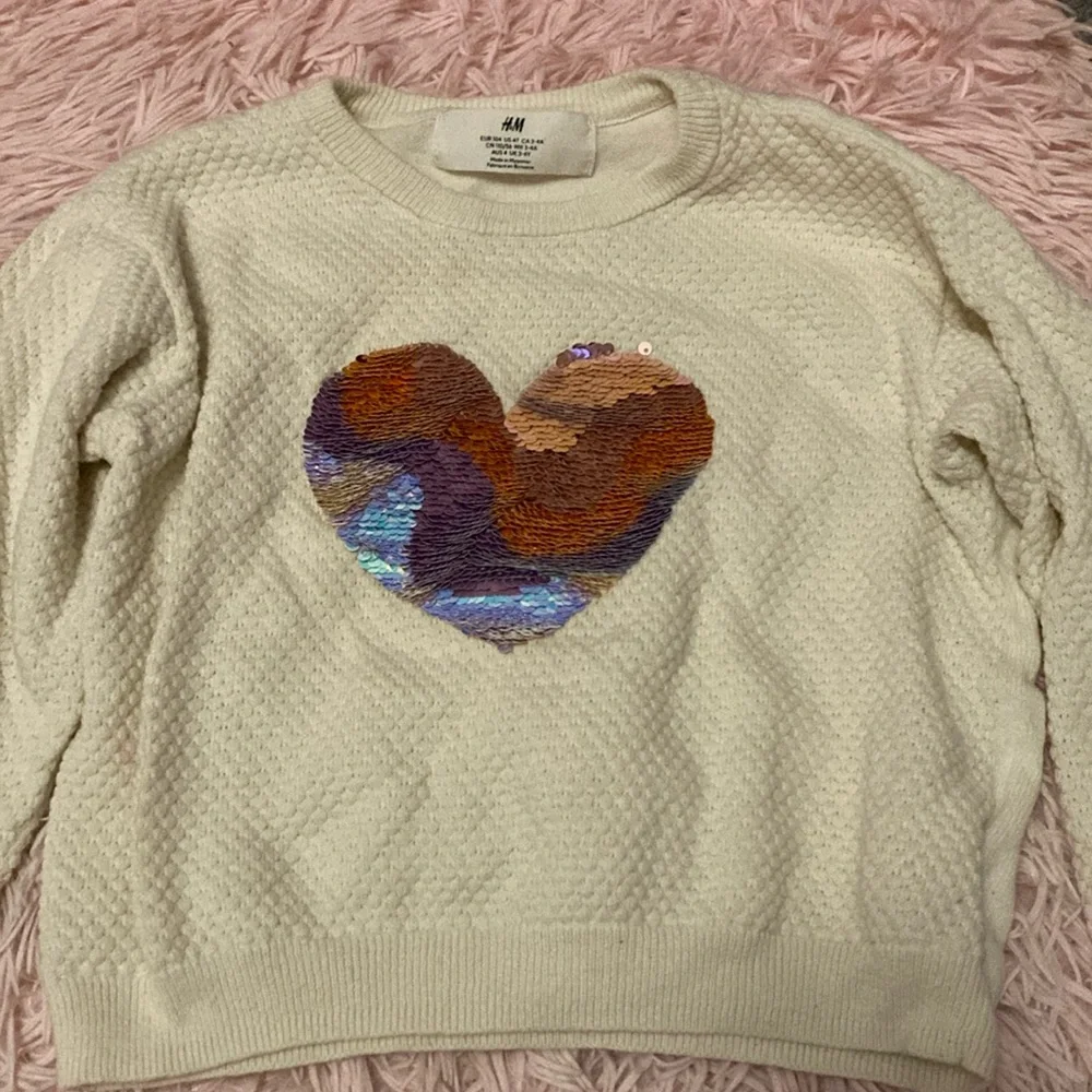 Pair of girls sweaters